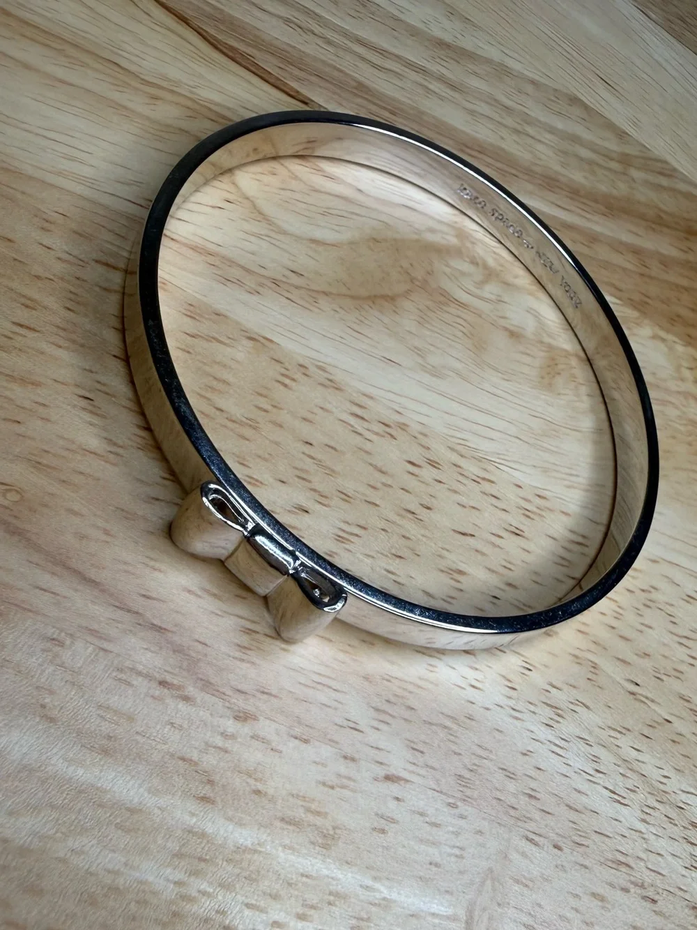 kate spade designed bow reach